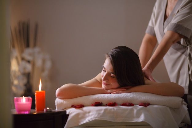 Girl on massage in the spa salon. | Premium Photo