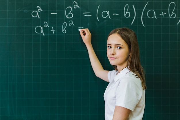 Girl in maths class | Free Photo