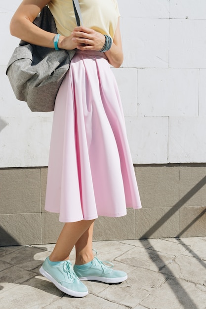 yellow top and pink skirt