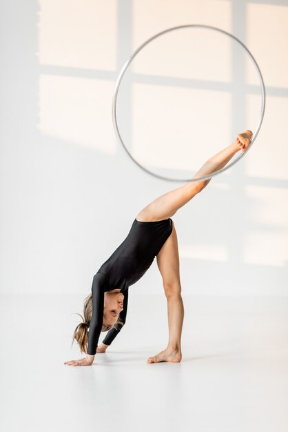 Premium Photo Girl Practising Rhythmic Gymnastic With A Ring 1902