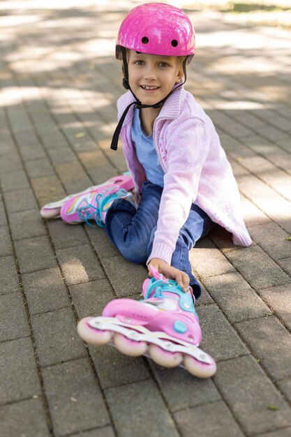 Premium Photo | Girl on roller skates in the park