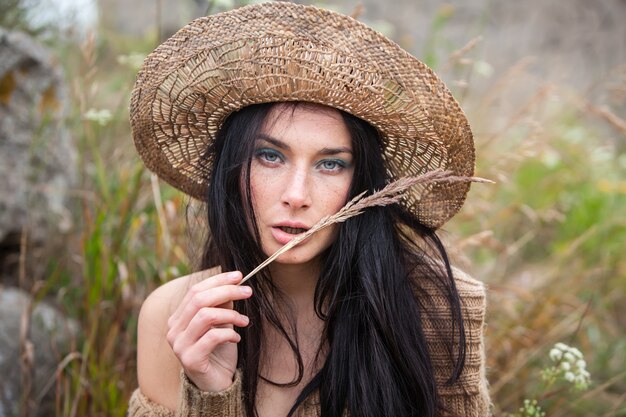 Premium Photo | Girl in straw hat