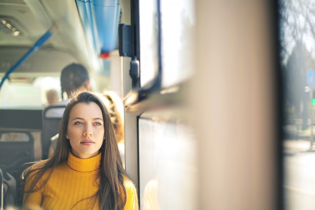 Premium Photo Girl Traveling On A Bus