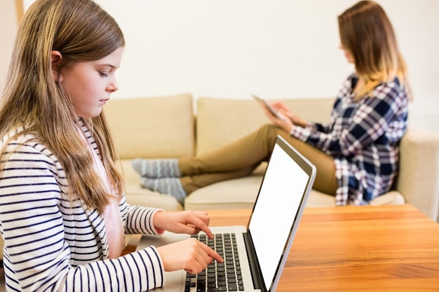 Girl On Laptop In Living Room