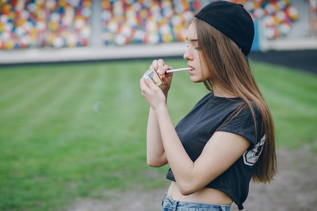 Girl with a cigarettes Free Photo