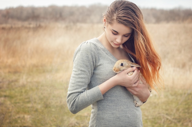 girl-with-rabbit-happy-little-girl-holding-cute-fluffy-bunny_78450-406.jpg