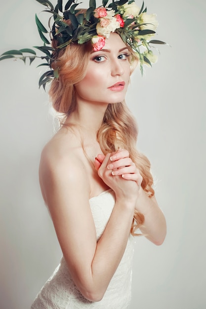 Premium Photo | Girl with a wreath of flowers on her head