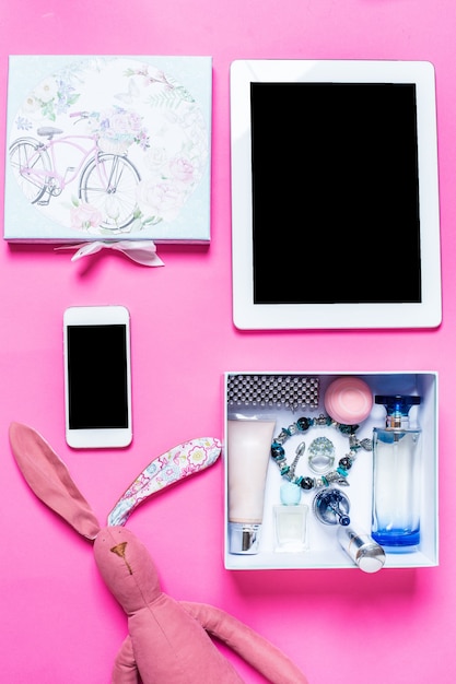 Premium Photo | Girls accessories on a pink background