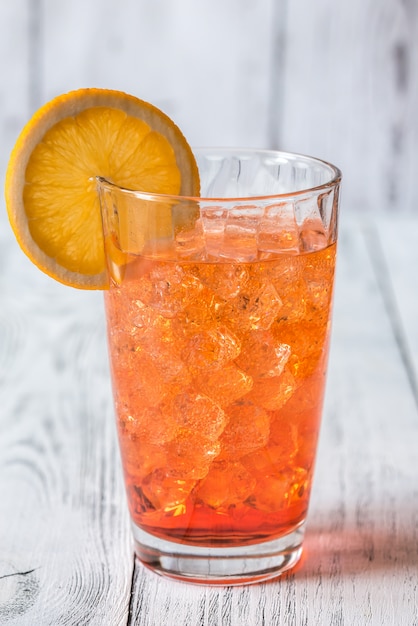 Glass of aperol spritz cocktail | Premium Photo