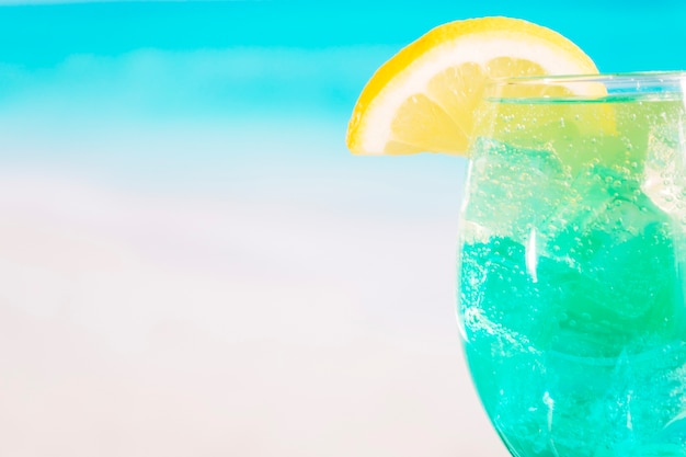 Free Photo | Glass of bright blue drink with lime