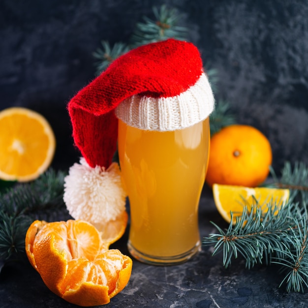 Download Premium Photo A Glass Of Christmas Craft Beer With Oranges Yellowimages Mockups