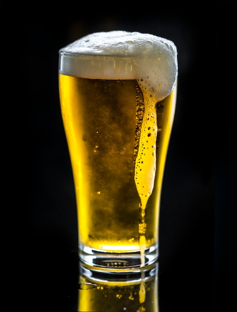 A glass of cold beer macro photography Photo | Free Download