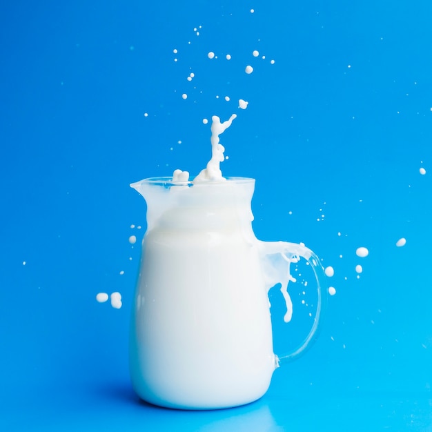 Glass jar full of milk | Free Photo