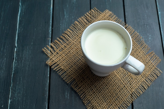 Premium Photo Glass Of Milk On Table On Blurred Natural 4075