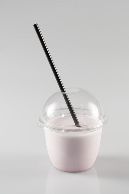 Premium Photo | Glass of milkshake in plastic transparent cup isolated ...