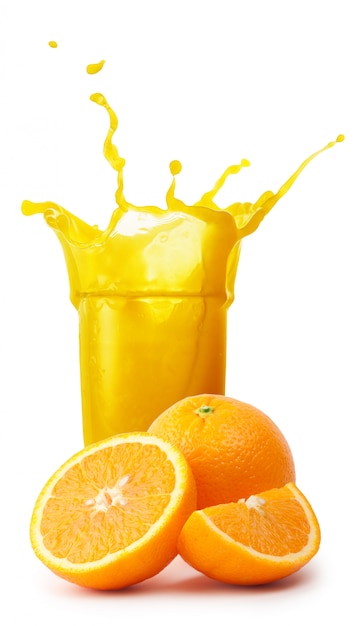 Premium Photo Glass Of Orange Juice With Splash And Cut Of Oranges