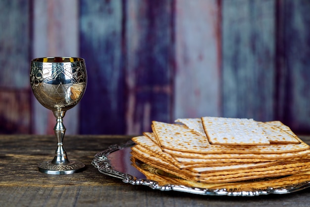 Premium Photo | Glass Of Passover Wine And Matzah Closeup. Backlit ...