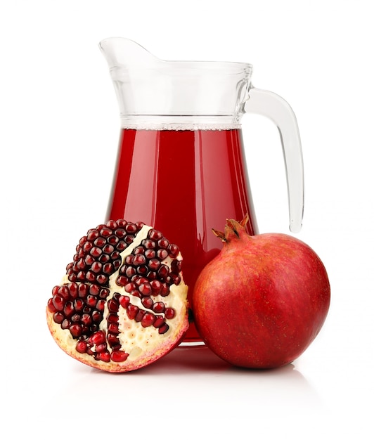 Premium Photo | Glass of pomegranate juice with fruits isolated