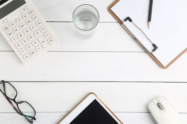 Glasses Calculator And Tablet On White Neat Desk Photo Free