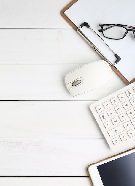 Glasses Calculator And Tablet On White Neat Desk Photo Free