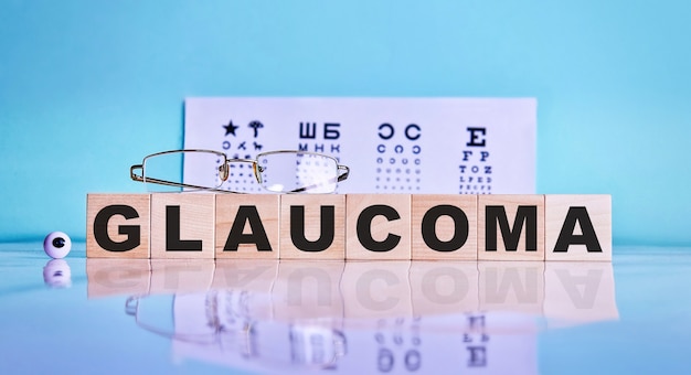 Premium Photo | Glaucoma Word Written On A Wooden Cubes, Glasses, Eyes ...