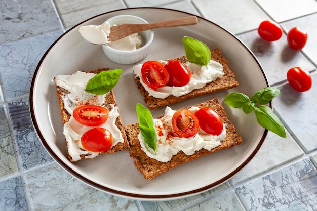 Premium Photo | Gluten free organic tomato crackers with lactose free ...