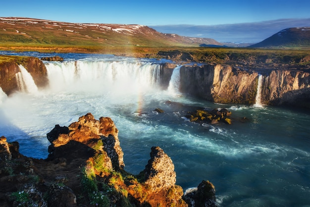 Premium Photo | Godafoss waterfall at sunset. fantastic rainbow ...