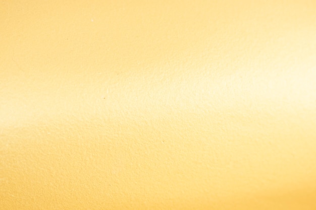 Premium Photo  Gold background or texture and gradients shadow.