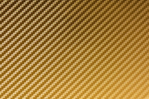 Premium Photo | Gold carbon fiber composite raw material background