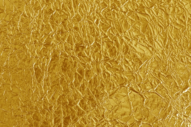 Premium Photo | Gold foil leaf shiny texture