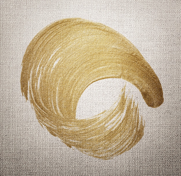 茶色の布のテクスチャ背景にゴールドの油絵筆ブラシストロークテクスチャ 無料の写真