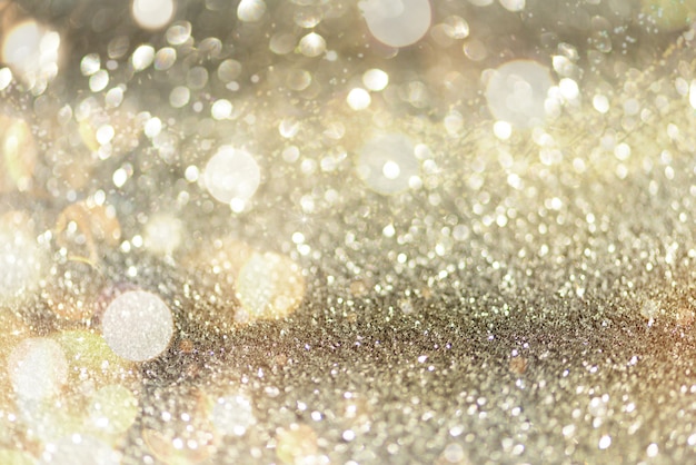 Premium Photo | Gold and silver abstract bokeh lights.