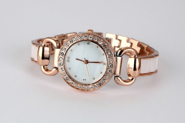 Premium Photo | Gold watch with rhinestones