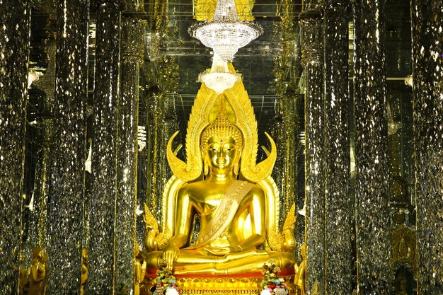 Premium Photo Golden Buddha Statue At Cathedral Glass Temple In Uthai Thani