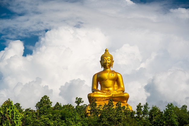 Premium Photo Golden Buddha And White Clouds Buddha Statue With Big Clouds With Copy Space