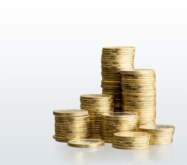 Premium Photo | Golden coin stacks on background