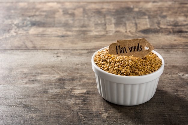 Premium Photo | Golden Flax Seeds In White Bowl