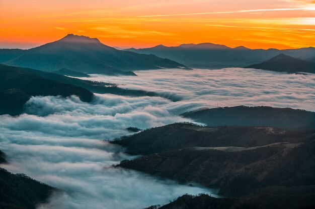 Premium Photo | Golden hour from mount peñas de aya one winter morning ...