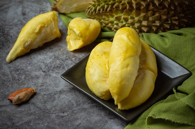 Golden yellow durian flesh seasonal fruit thai fruit concept. Free Photo
