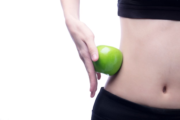 Good healthy body and curve waist and green apple Free Photo