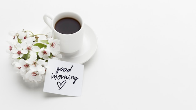 Good morning cup of coffee with flower | Free Photo