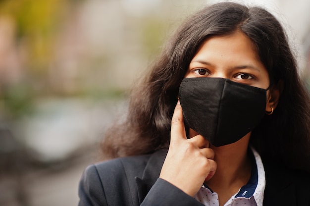 Premium Photo Gorgeous Indian Woman Wear Formal And Black Face Mask