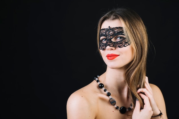 Free Photo | Gorgeous smiling woman in masquerade carnival mask on