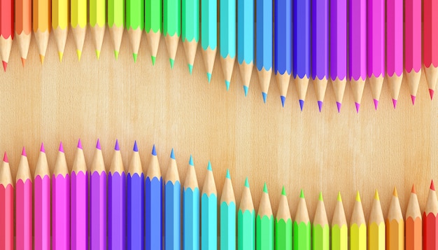 自然な木製の背景にグラデーション色鉛筆 プレミアム写真