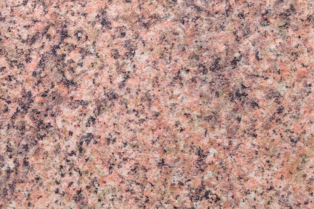 ピンクと黒の斑点を持つ粒子の粗い茶色の背景 インテリアの小さなクラムパターンのテクスチャ背景 プレミアム写真