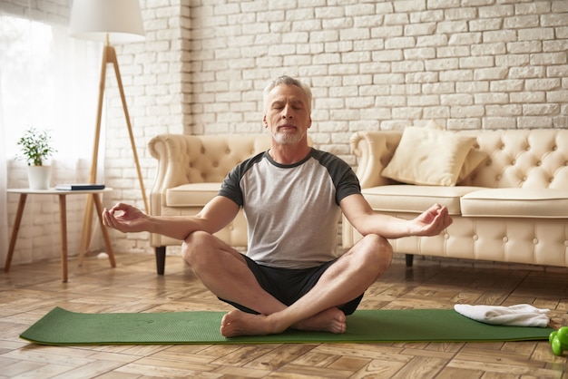 Premium Photo | Grandpa in lotus position peace and relaxation.