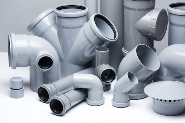 Gray polypropylene tubes on a white background Premium Photo