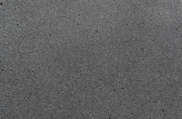 灰色のスポンジの背景テクスチャ プレミアム写真