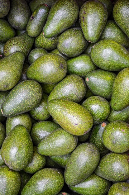 Premium Photo | Green avocados