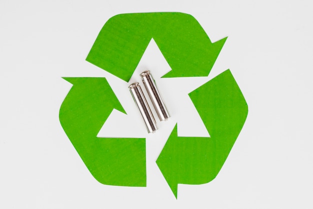 Download Free Download This Free Photo Green Eco Recycle Symbol And Used Batteries Use our free logo maker to create a logo and build your brand. Put your logo on business cards, promotional products, or your website for brand visibility.